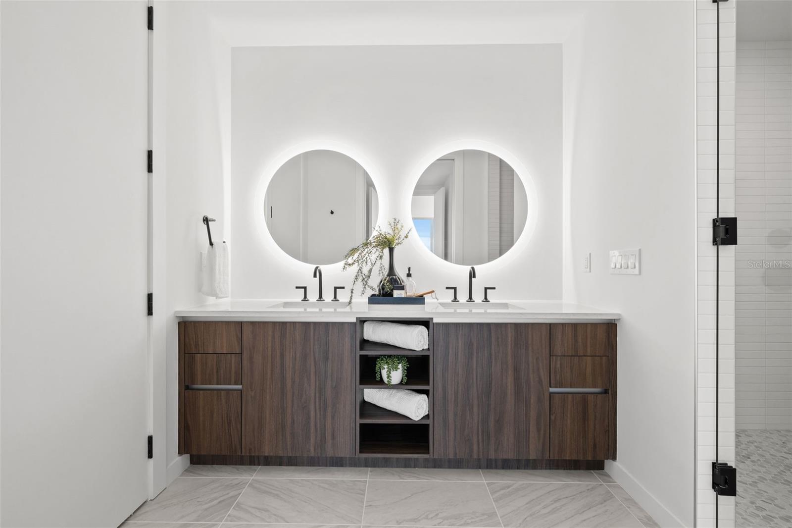 Dual vanity with lit mirrors