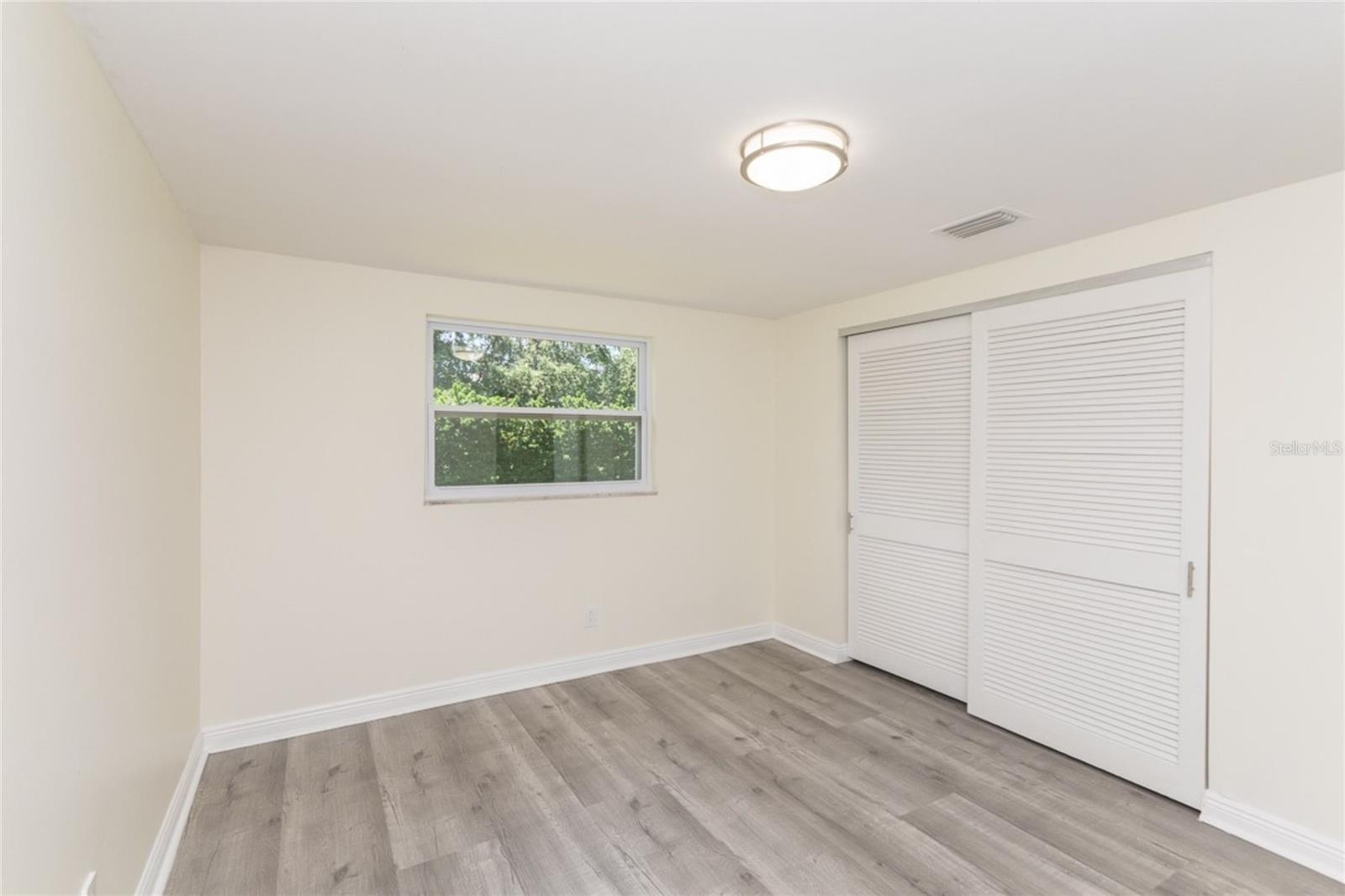 Bedroom 2 – Window View Overlooking Yard