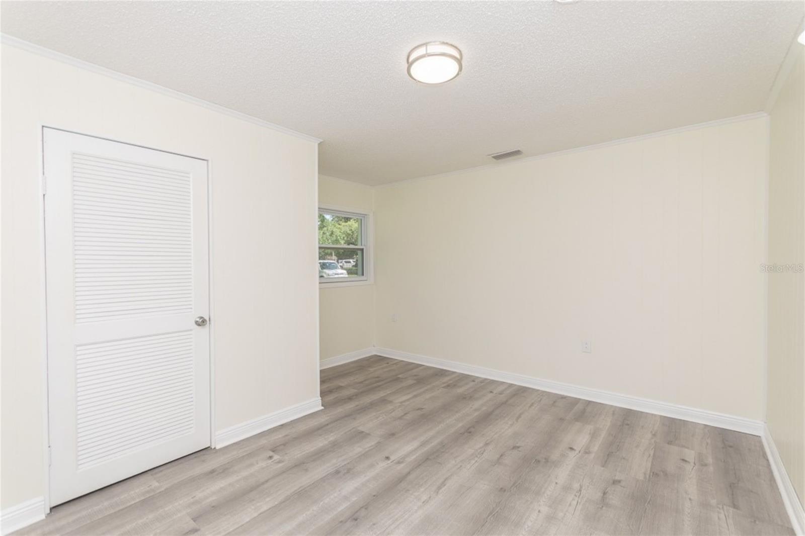 Bedroom 4 – Window overlooking yard & Versatile Design