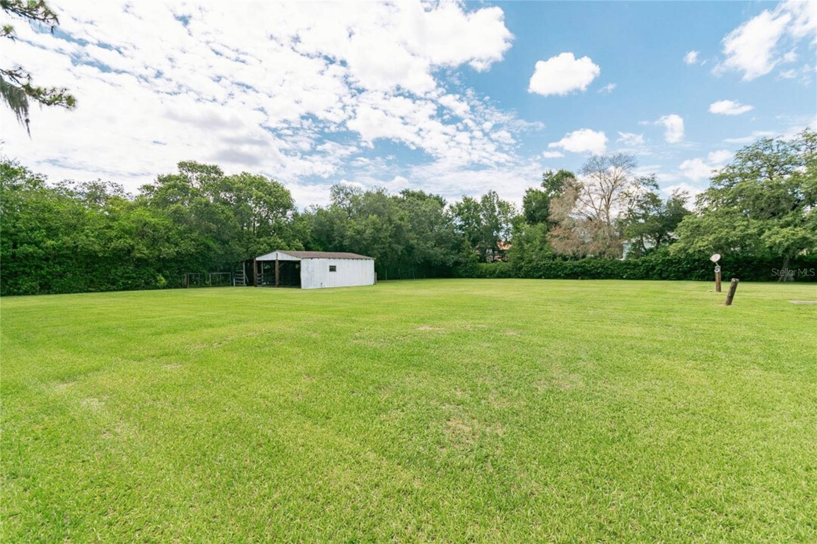 Side Angle of Barn with Open Land Surroundings