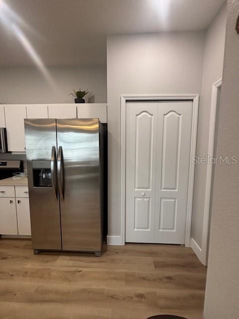 Pantry in the kitchen with newer appliances.