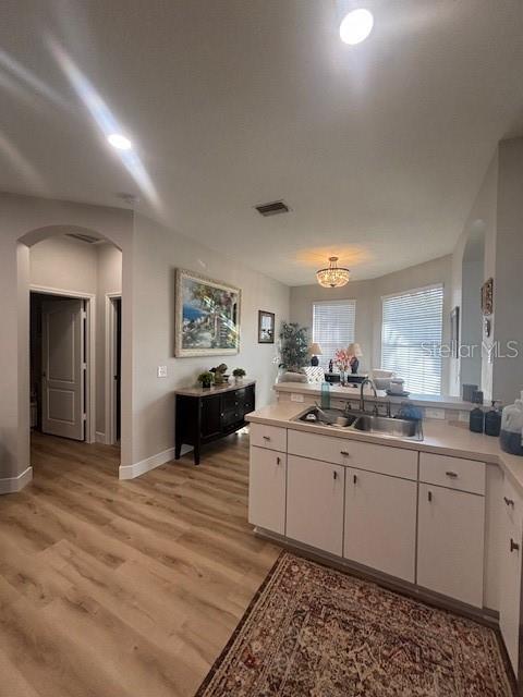 Kitchen with view of dining room.