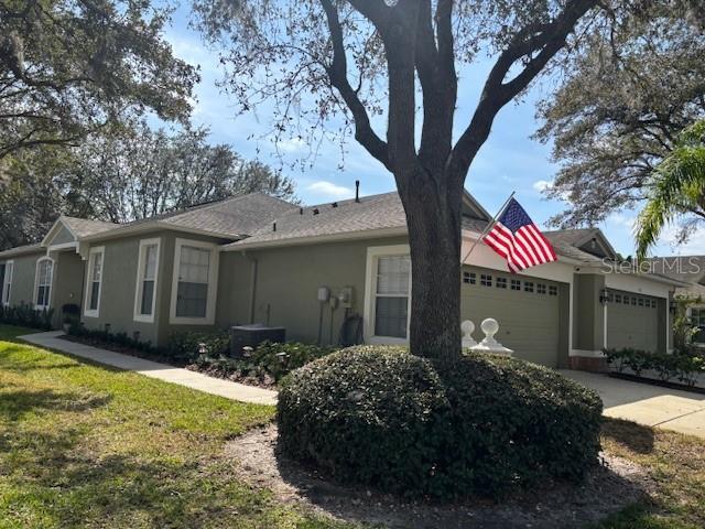 Front of the home with 2 car garage.