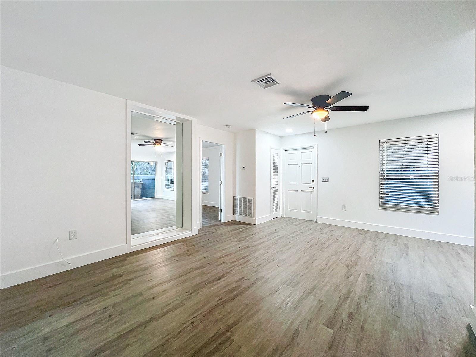 Living Room / Door to Primary Bedroom