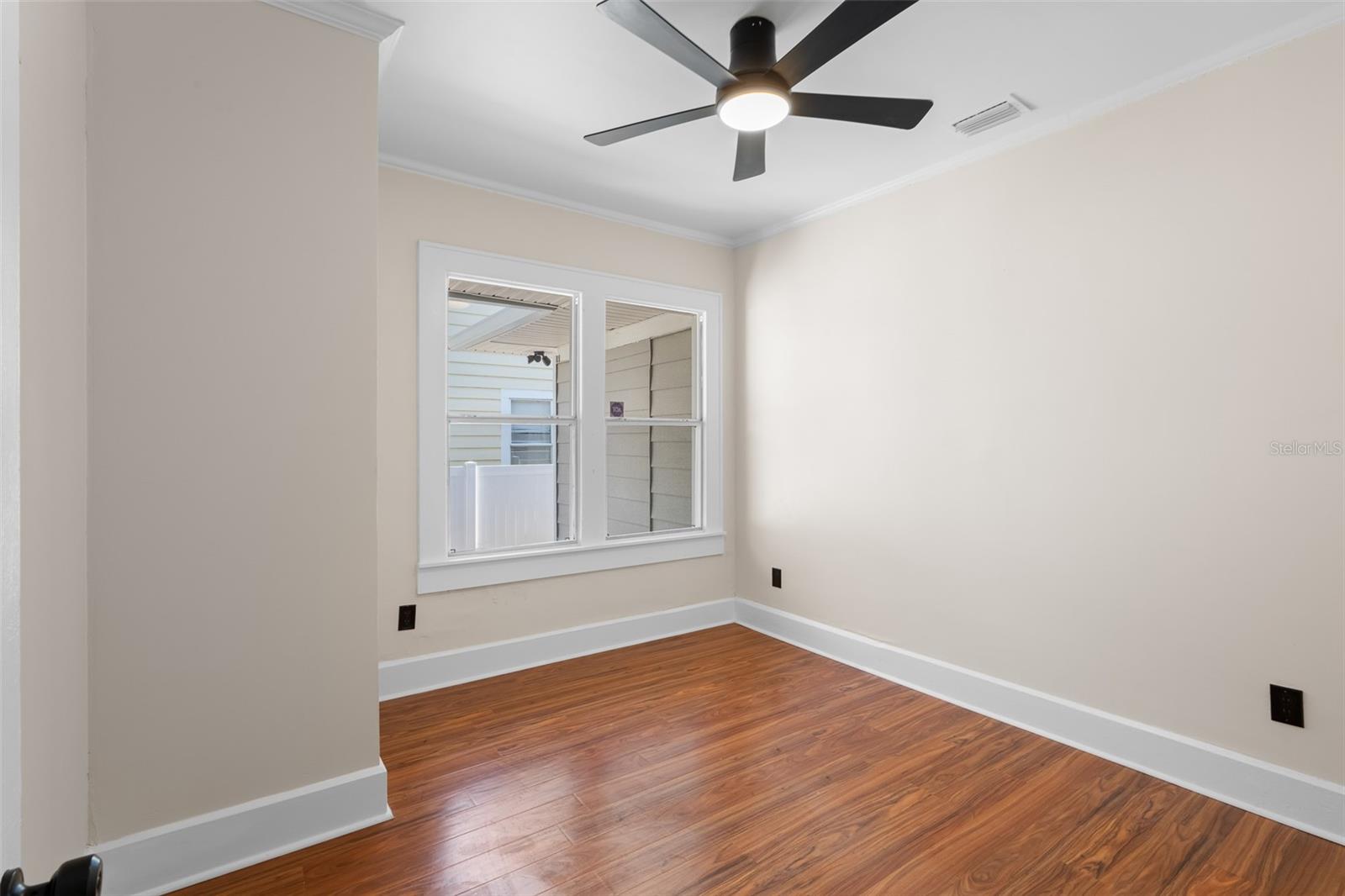 Third bedroom (closest to kitchen).