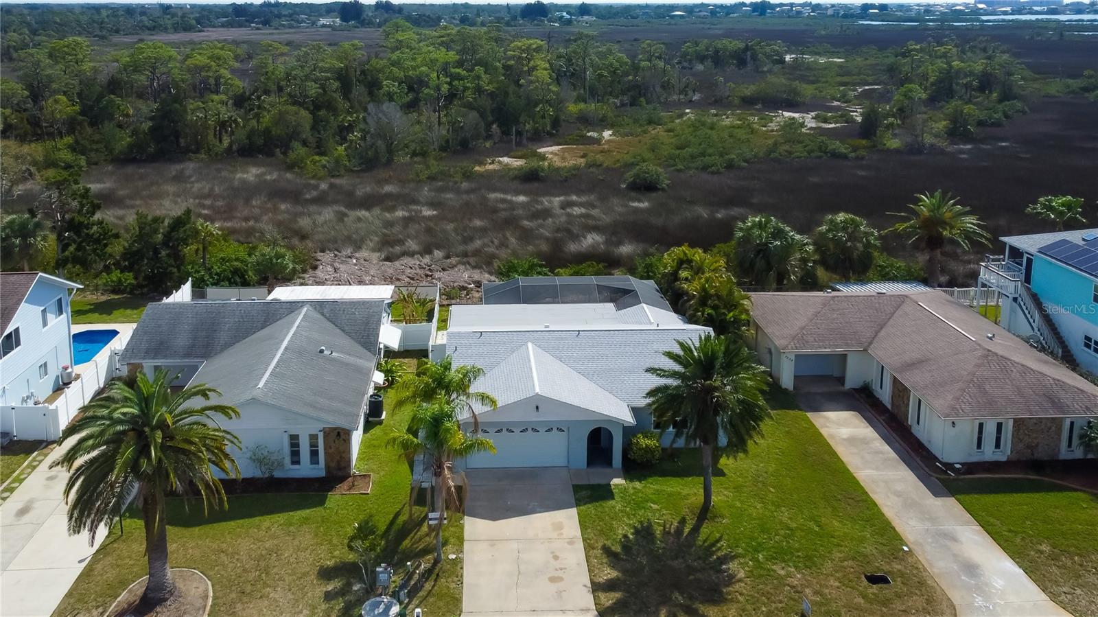 An Affordable Move in Ready Waterfront Home.. There is Marshland as Far as the Eyes Can See Behind You! So Serene it's Breathtaking!