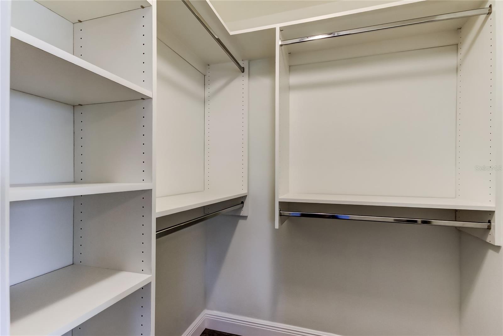 Owners Retreat Walk In Closet (5.3' x 5.5') is Custom Built Out for Excellent Storage Opportunaties