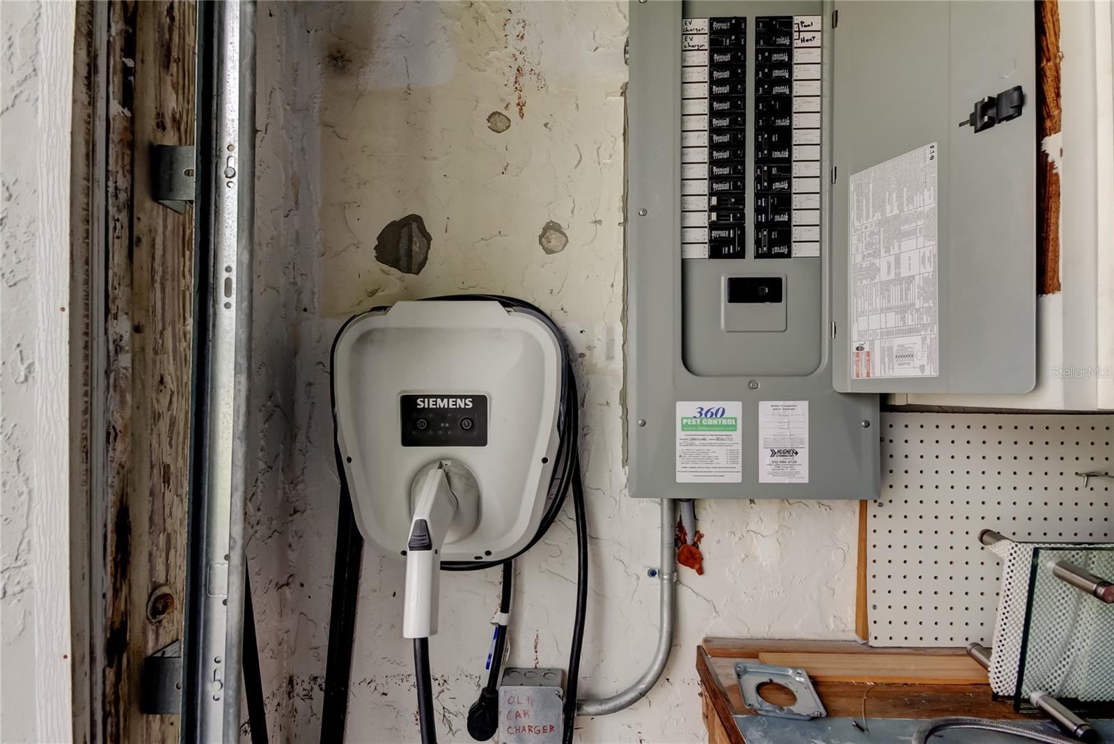 Electronic Vehicle Charging Station - Right in the Garage, Ready for YOU!