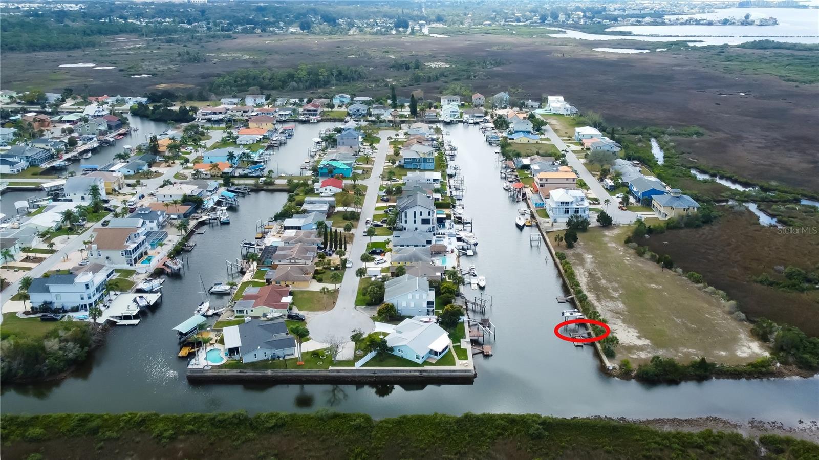 Aerial Showing Deeded Mooring Boat Slip & Home..