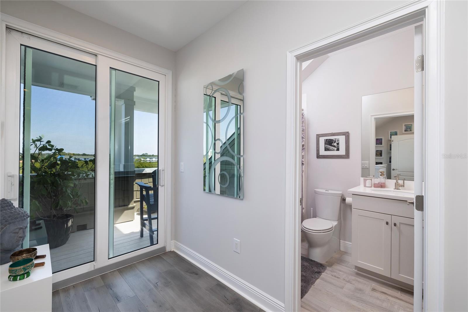 Upstairs en-suite bathroom and balcony