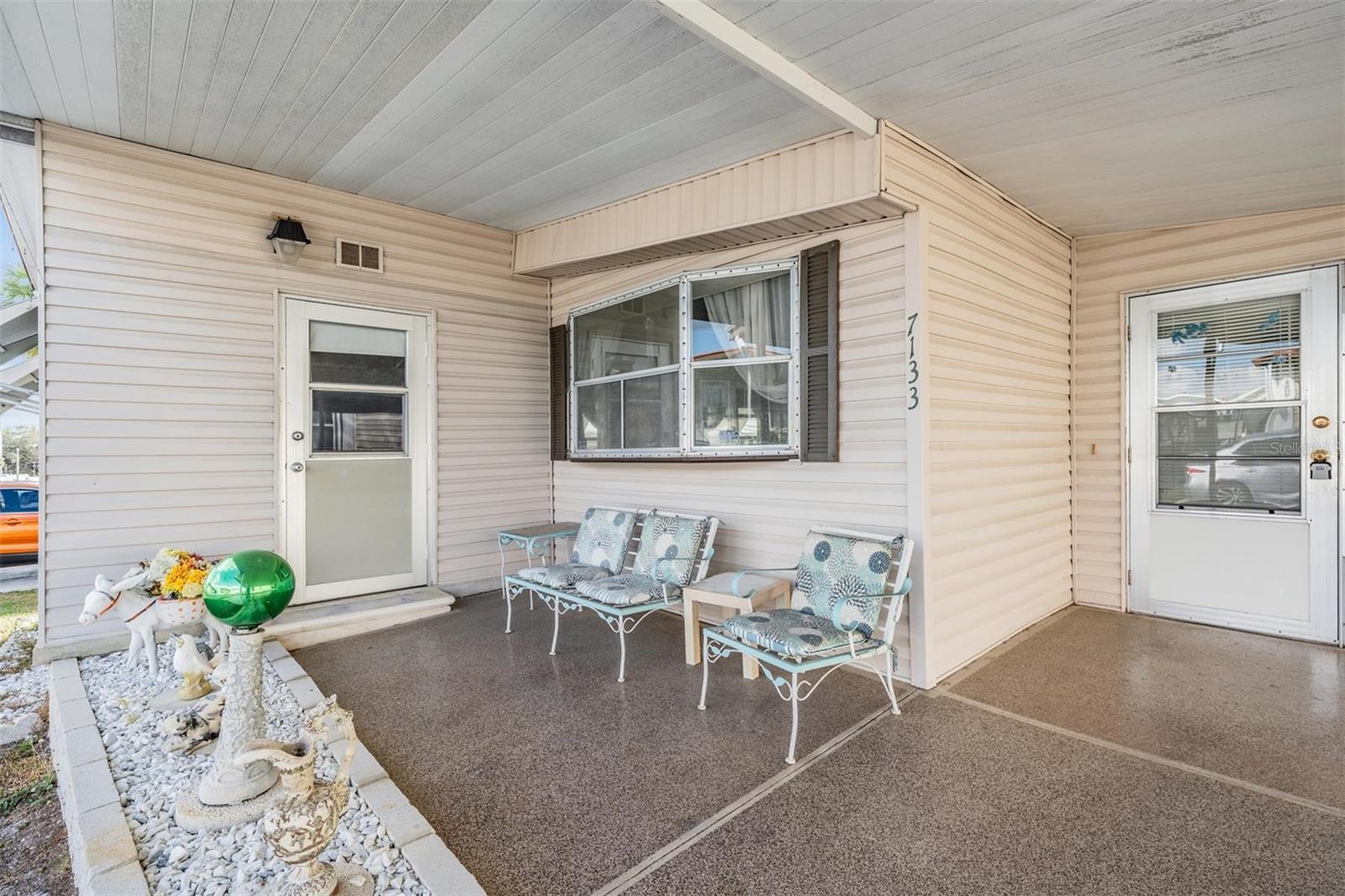 This home has a wonder covered front patio area.