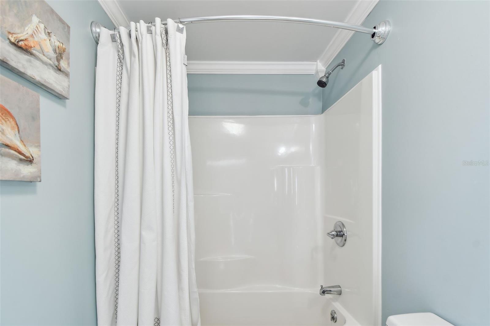 Shower and tub in  master ensuite bathroom