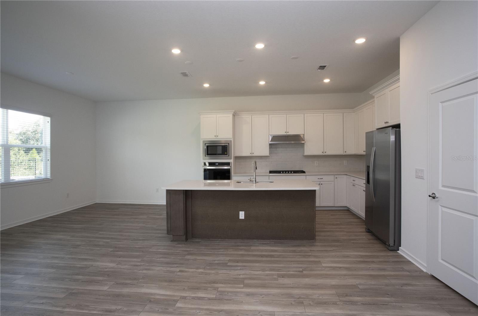 BEAUTIFULLY APPOINTED KITCHEN WITH STORAGE AND COUNTER SPACE!