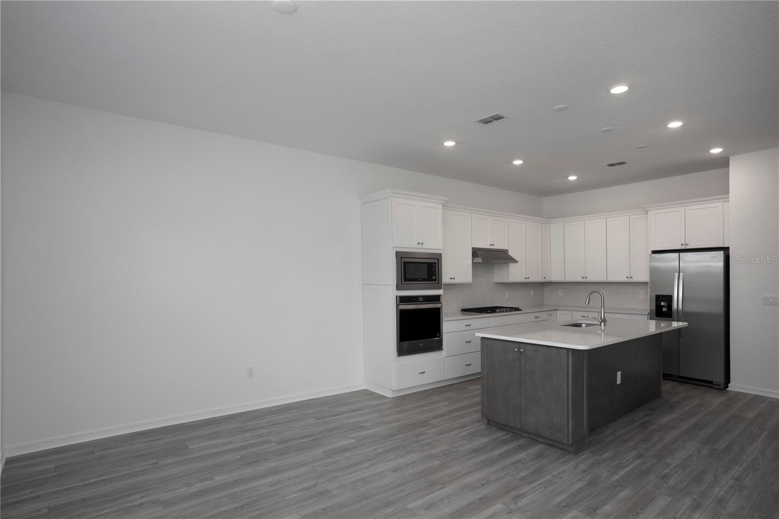 BEAUTIFULLY APPOINTED KITCHEN WITH STORAGE AND COUNTER SPACE!