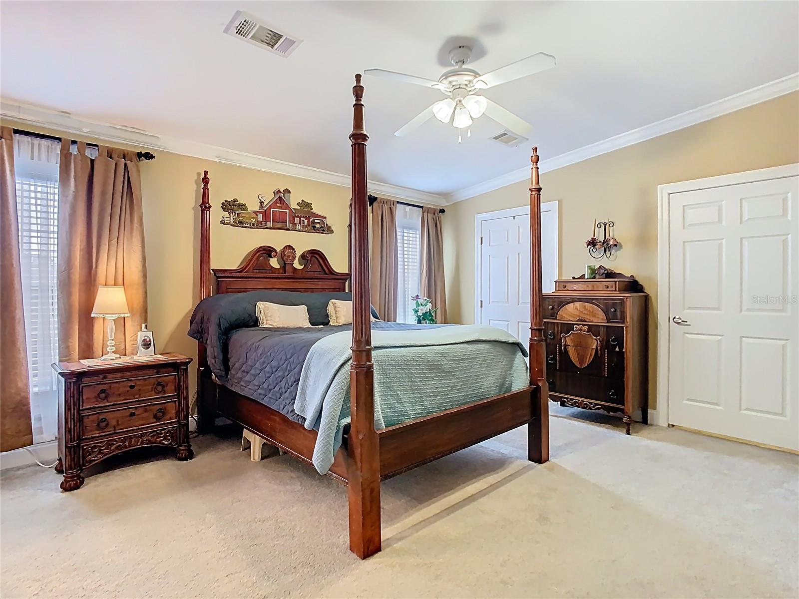 Primary bedroom with dual closets