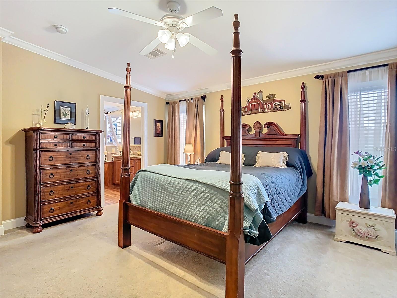 Spacious primary bedroom with ensuite and double closets