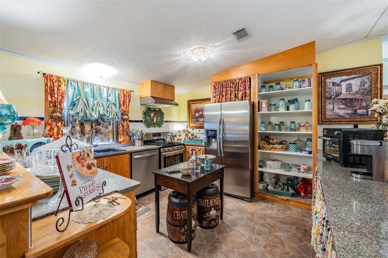 Spacious kitchen when center table removed