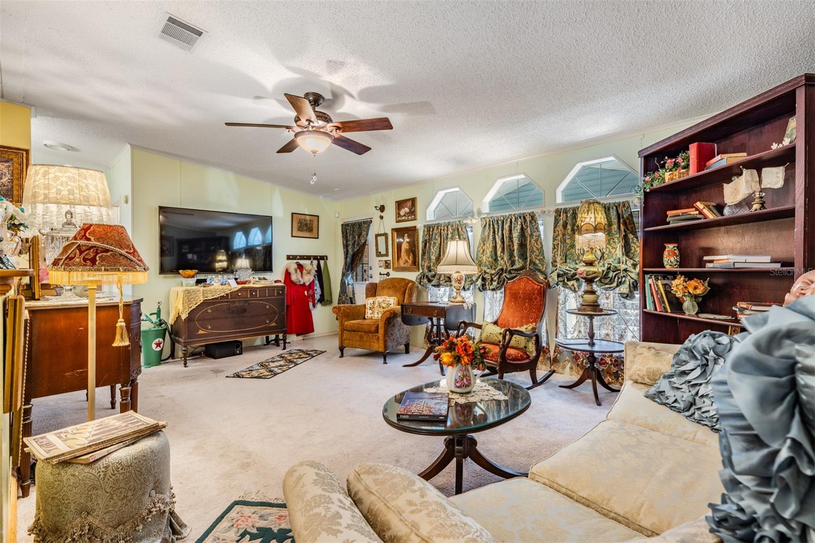 Triple Transom windows  in Living area let in natural light!