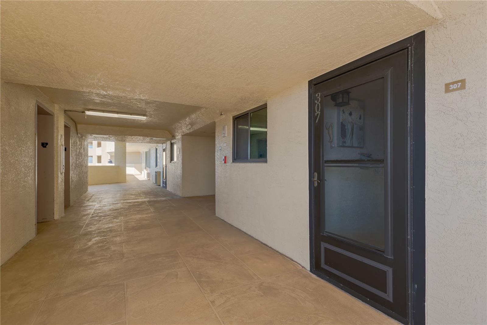 Unit 307 ~ easy access to elevators or staircase.