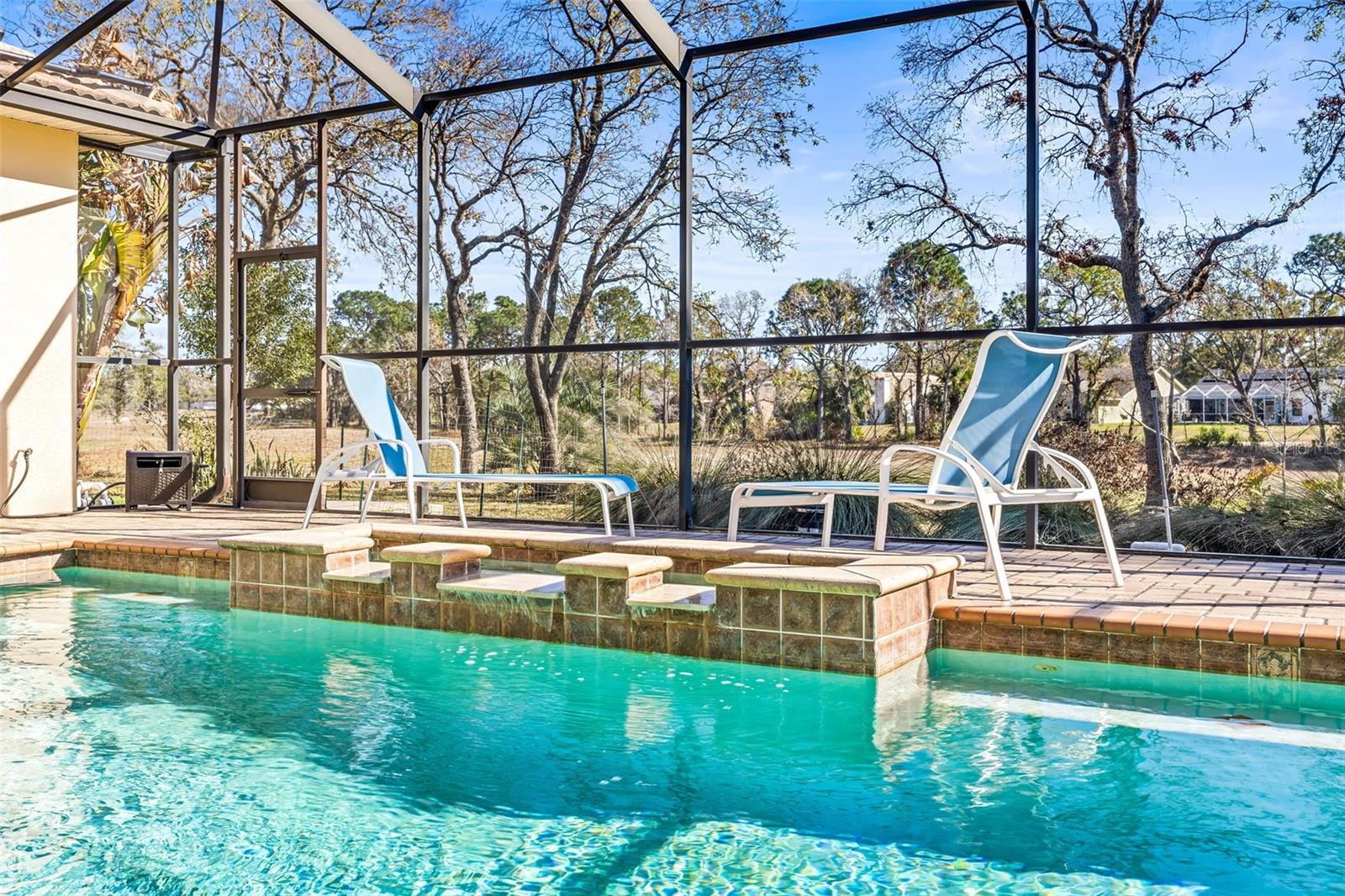 Pool with spill over fountain