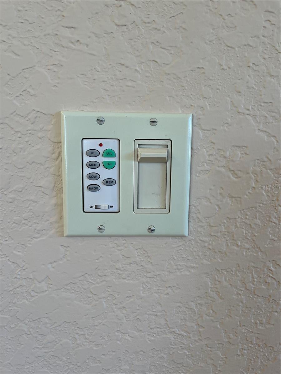 detail switch to operate lights and fan in family room