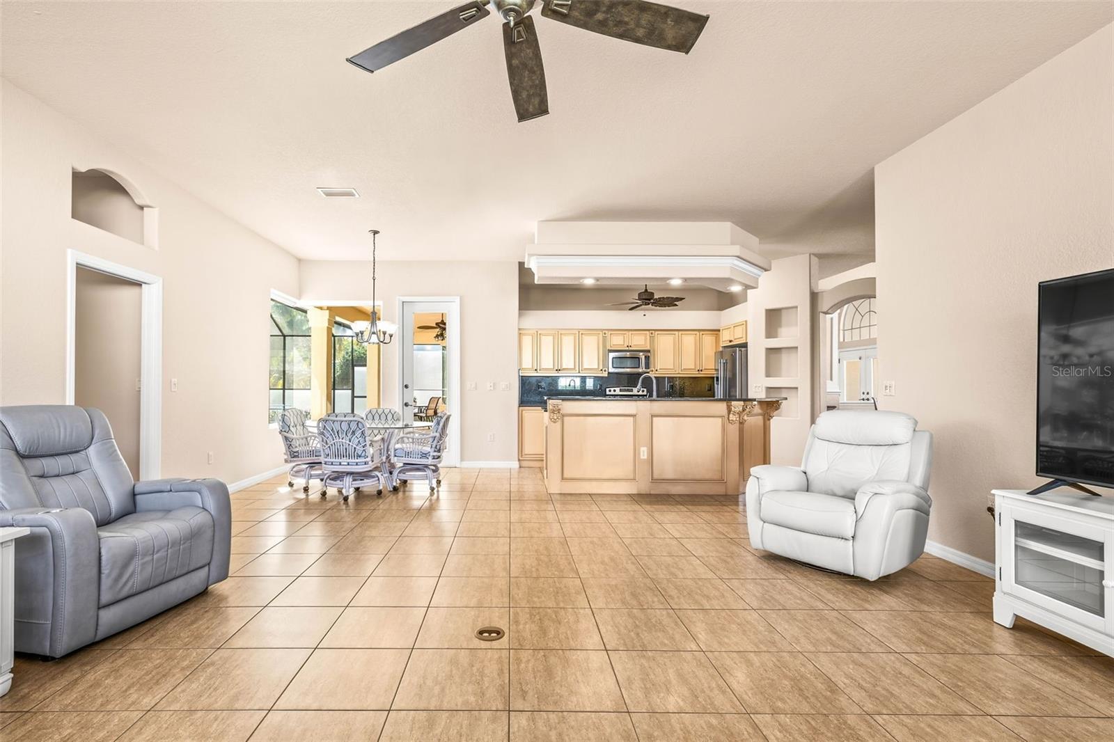 family room connected to kitchen