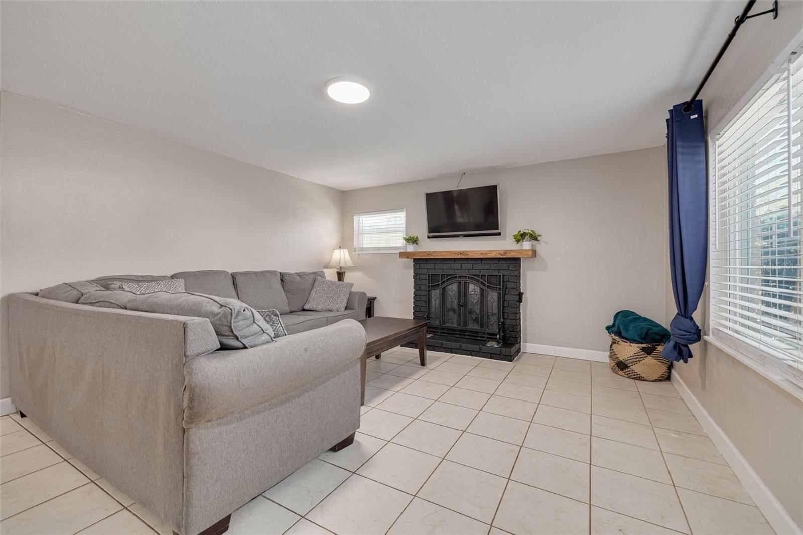 Living Room with Working Wood Burning Fireplace