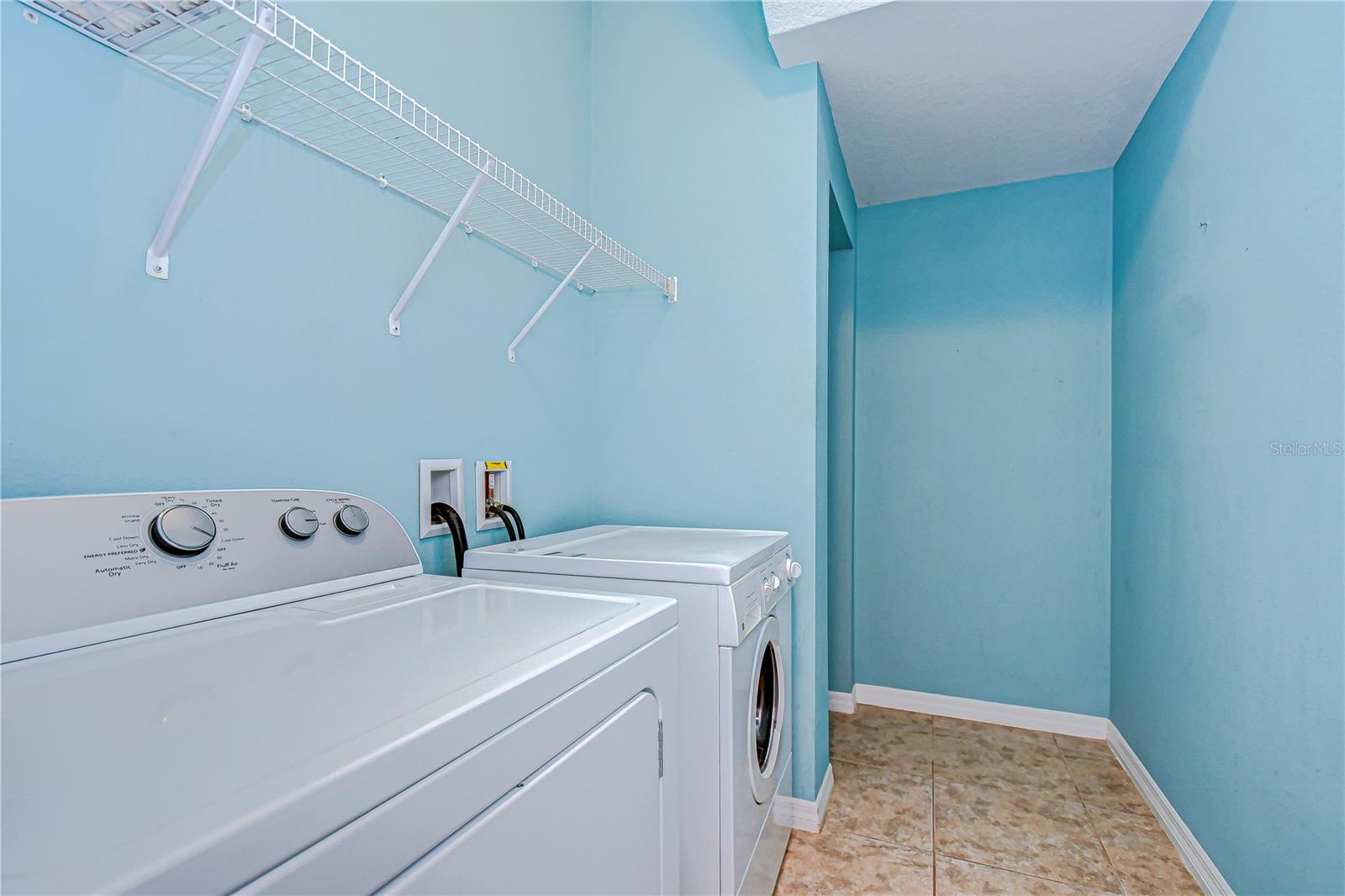 Enjoy the convenience of a laundry room to manage chores efficiently