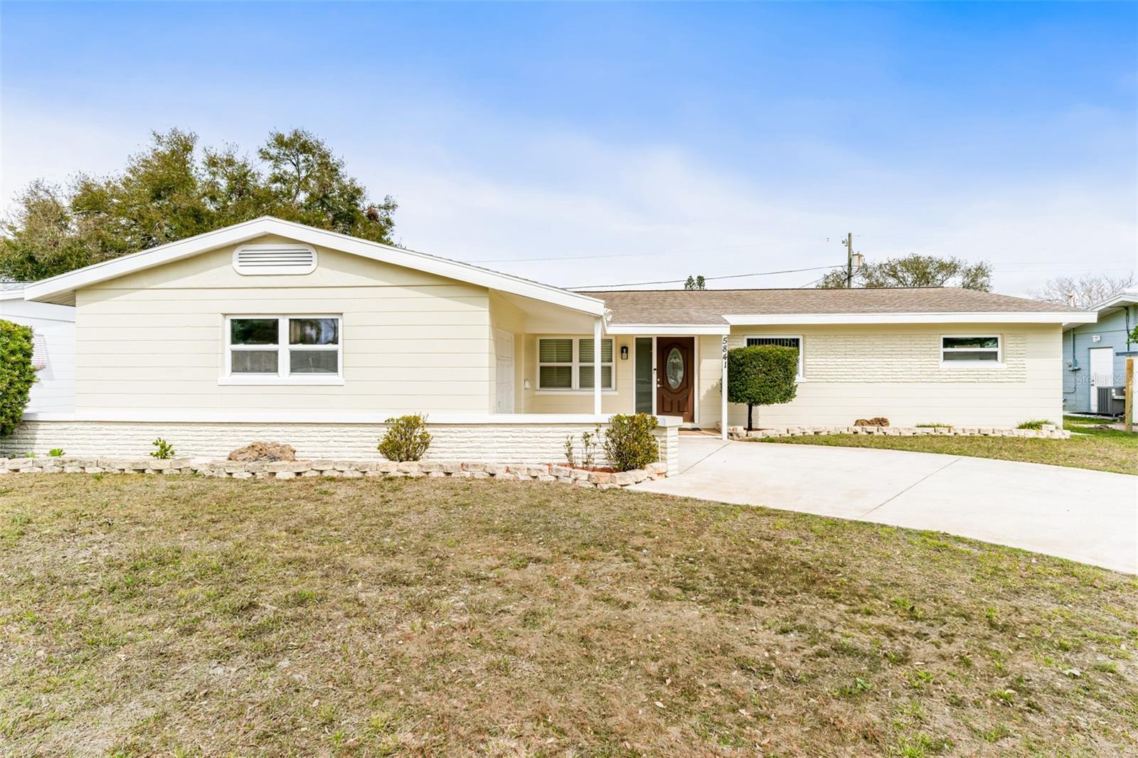 Front Exterior with large driveway