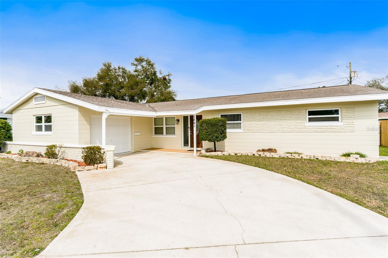 Front Exterior with large driveway