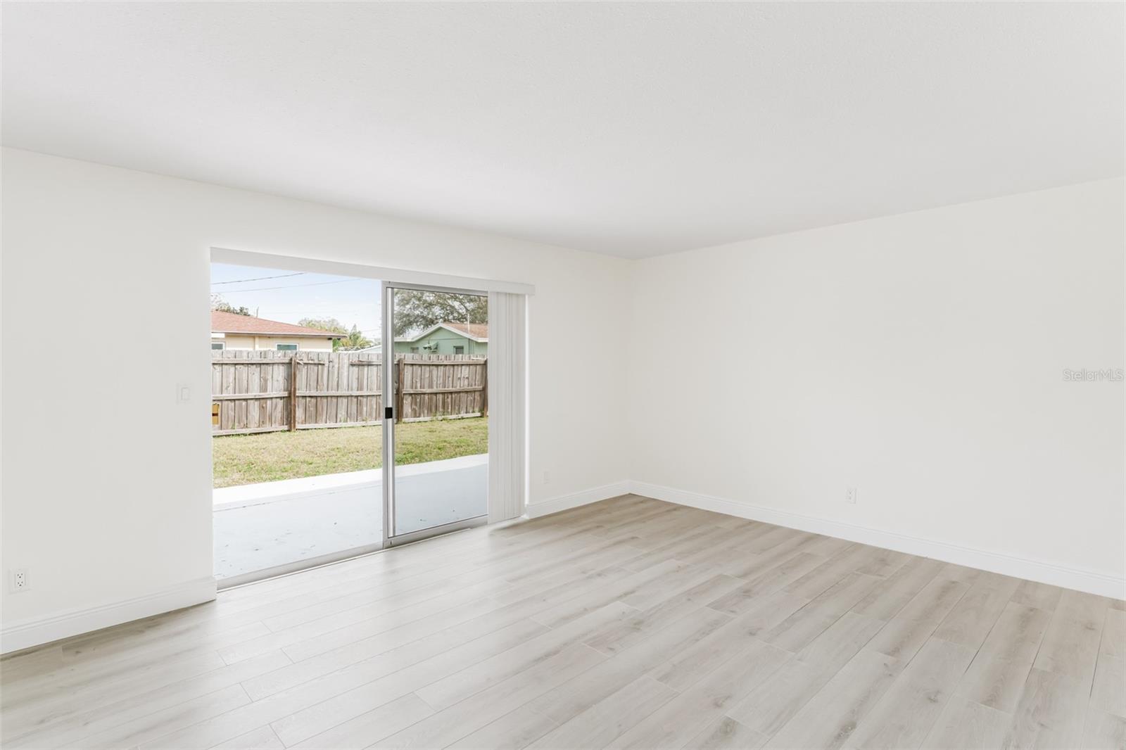 Living room with patio access