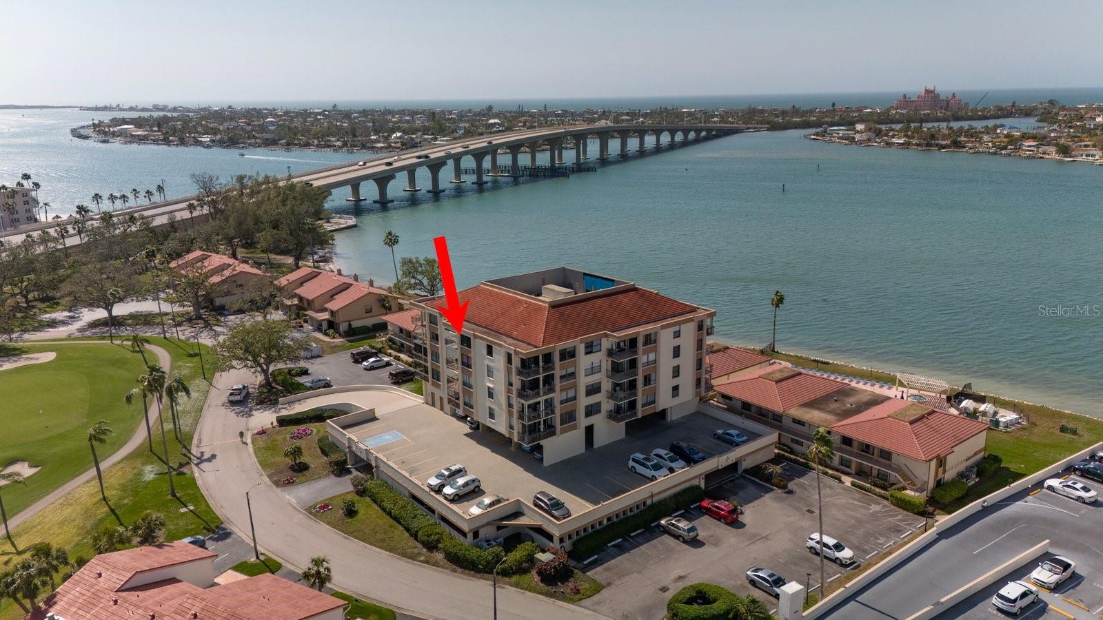 Gorgeous top floor condo with water view and golf course view