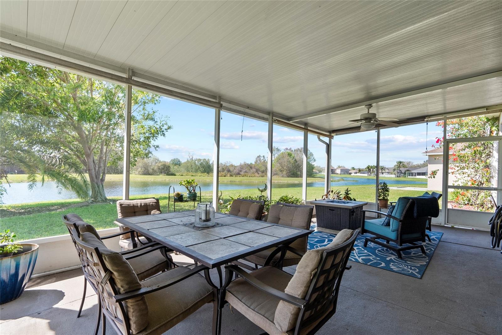 Lanai with views of pond and conservation