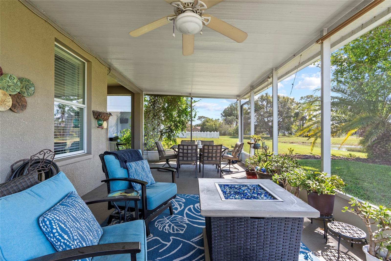 Lanai with views of pond and conservation