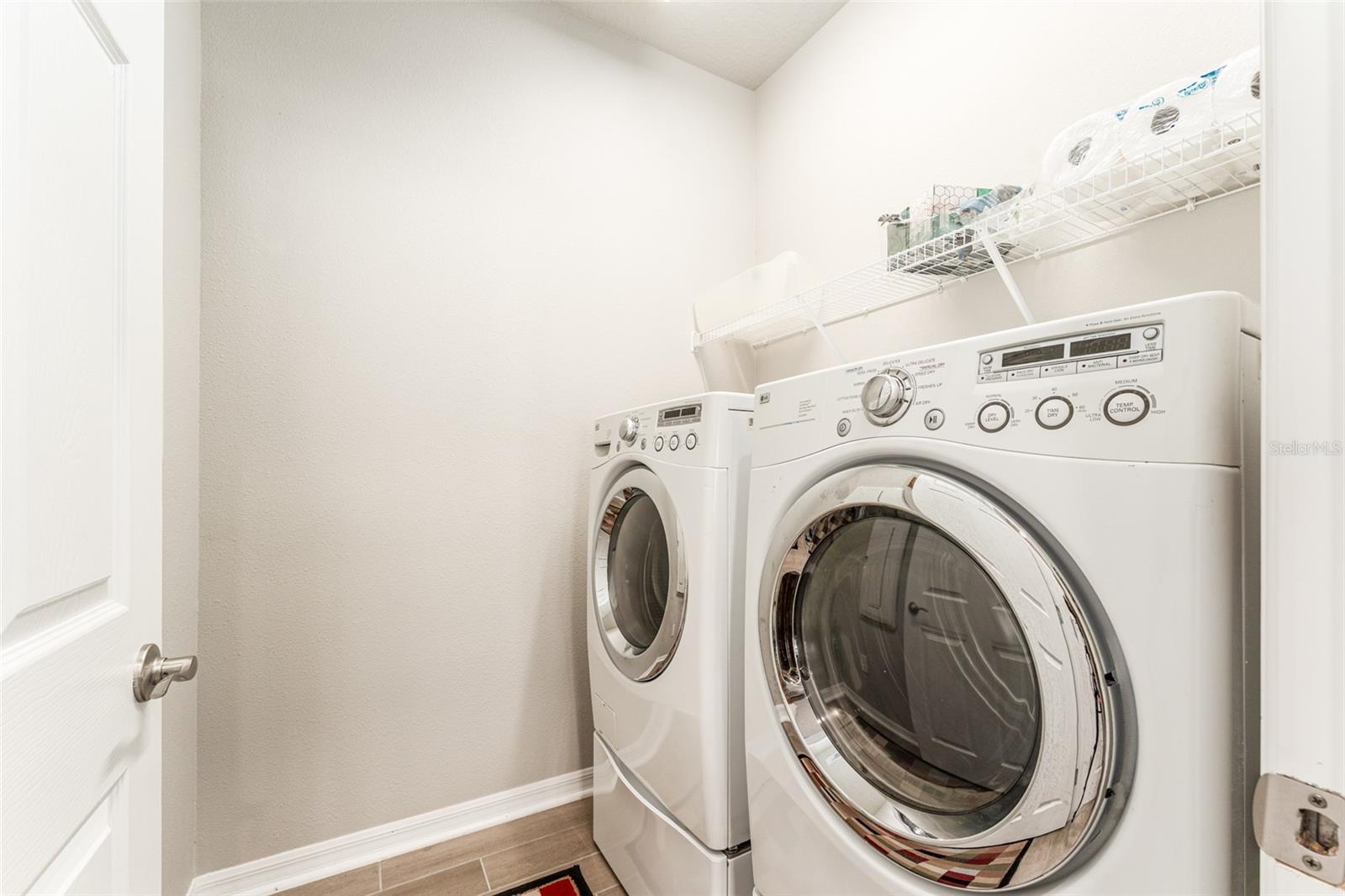 Laundry Room with Washer and Dryer That Convey with the Home