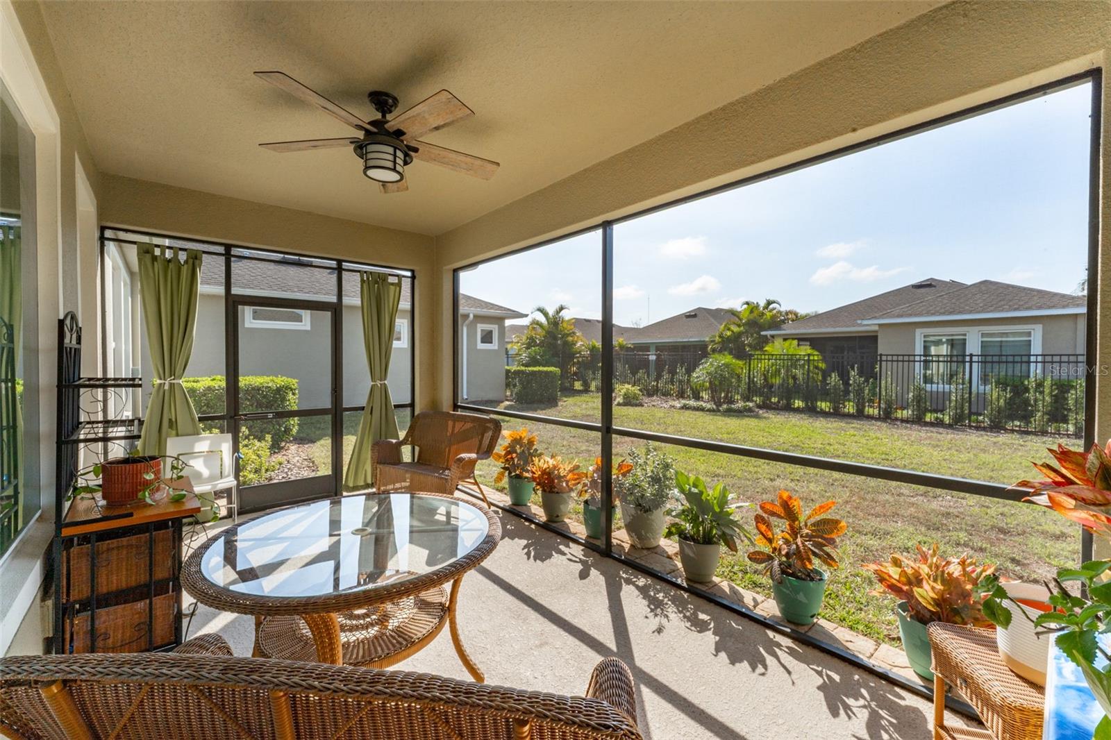 Outdoor Living Space Overlooking Spacious Backyard