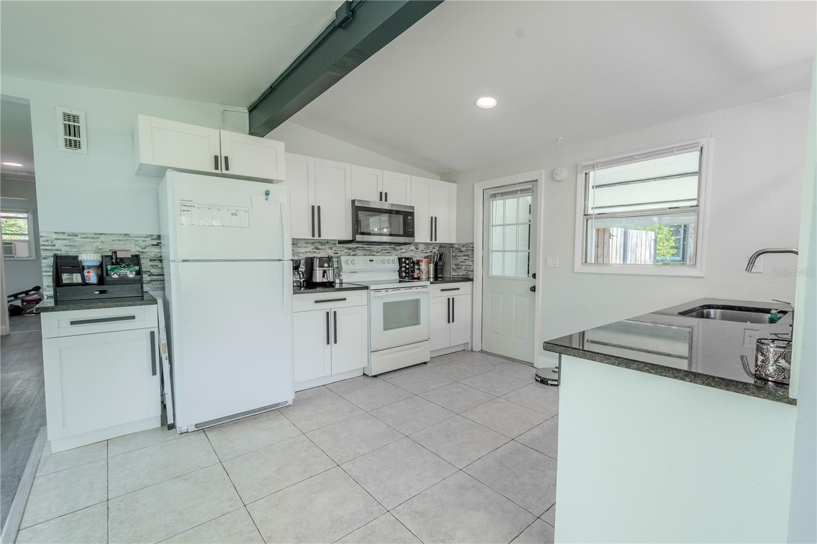 The cabinets feature modern, upgraded hardware.