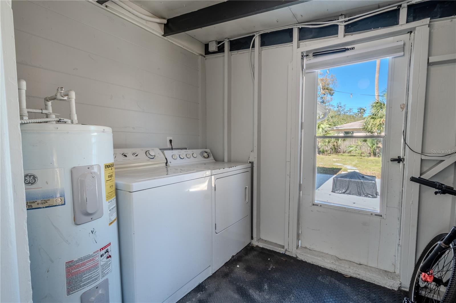 The laundry room features a washer/dryer 2020. Water heater 2020.