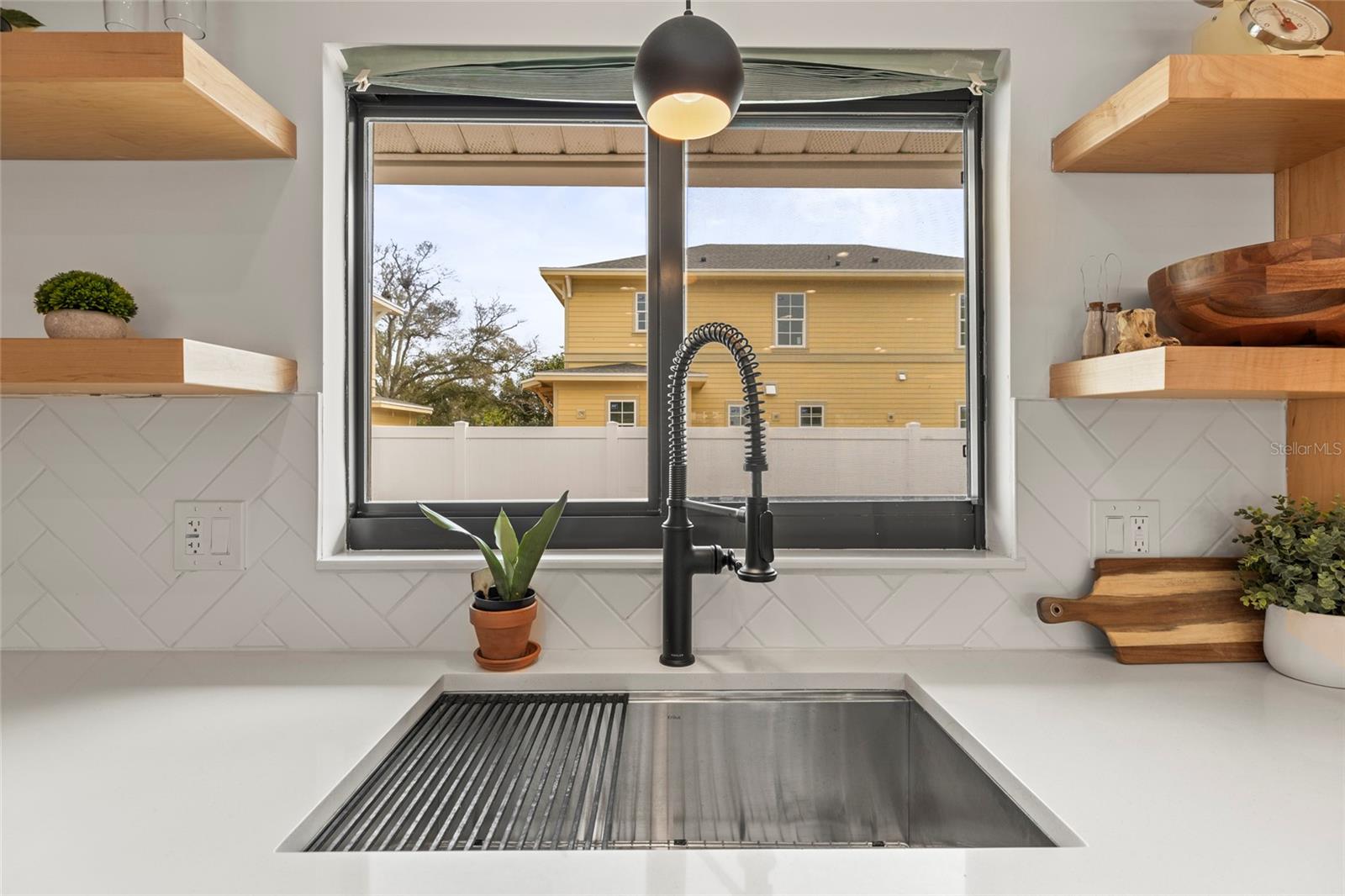 Sink Overlooks Backyard