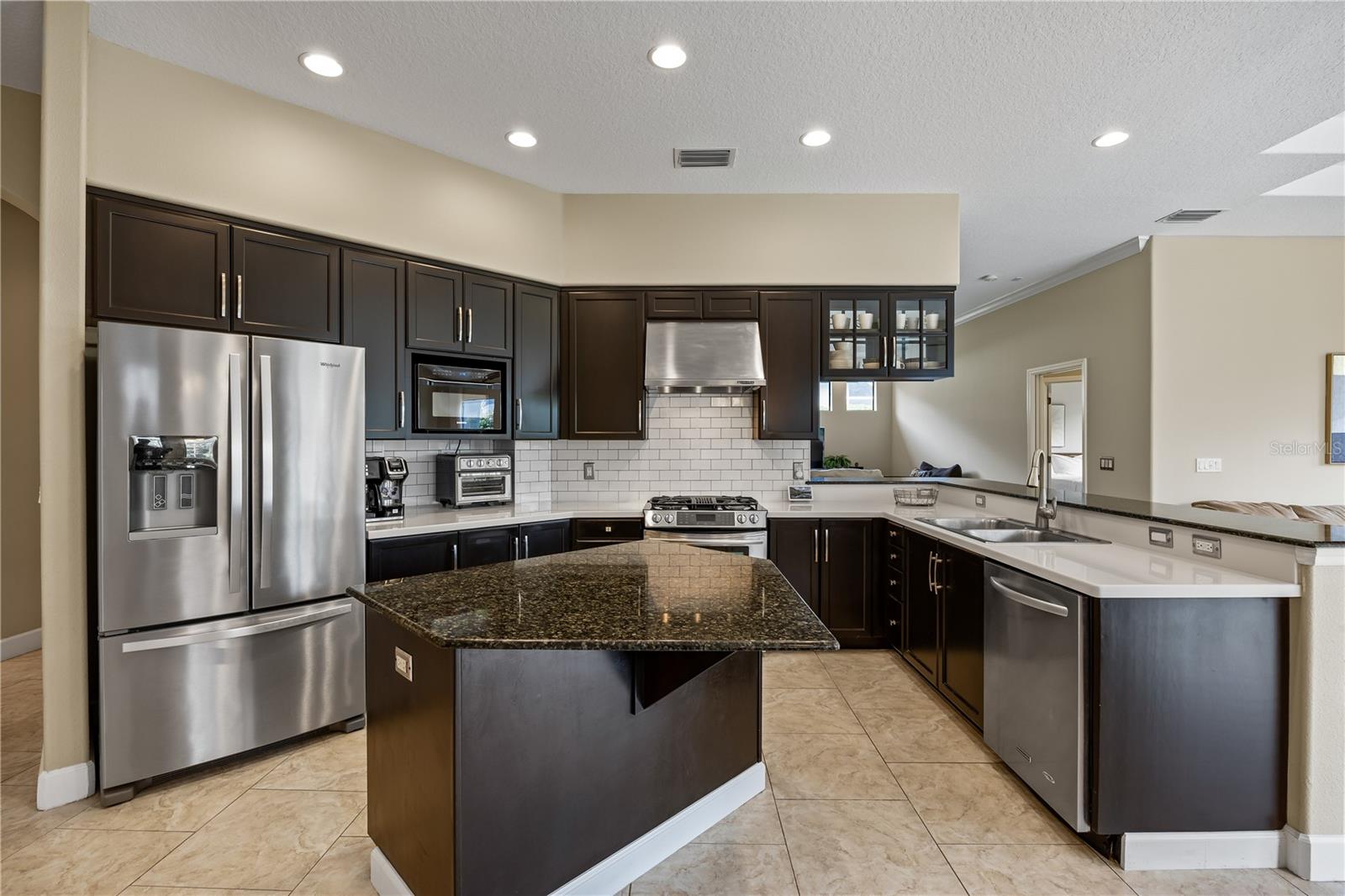 Kitchen with Island and Stainless Appliances