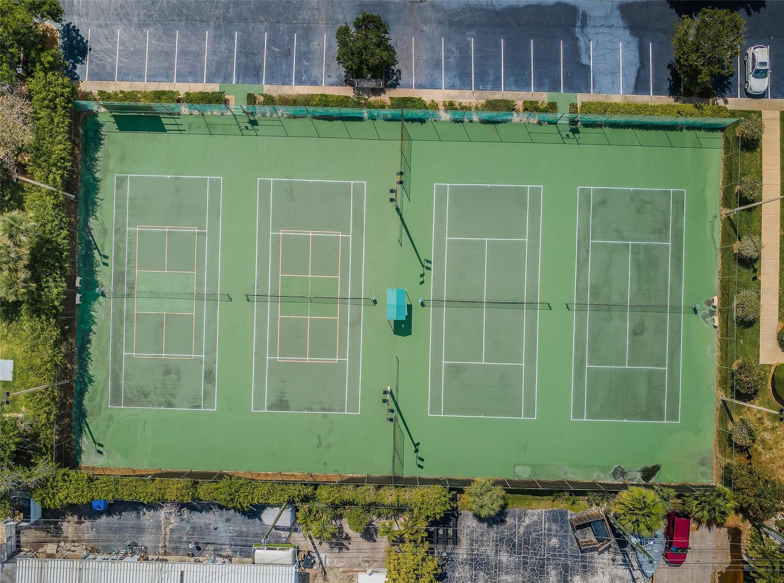 Arial of 4 lighted Tennis courts, 2 lined for pickle ball