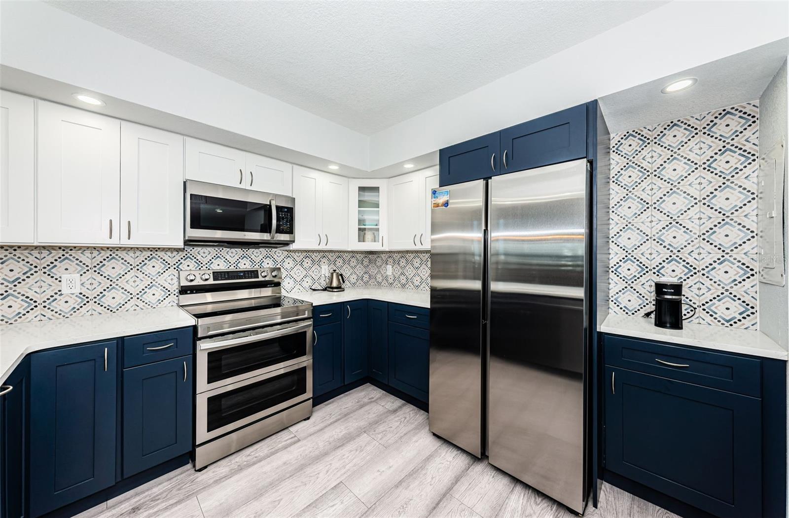 Kitchen with new stainless steel appliances