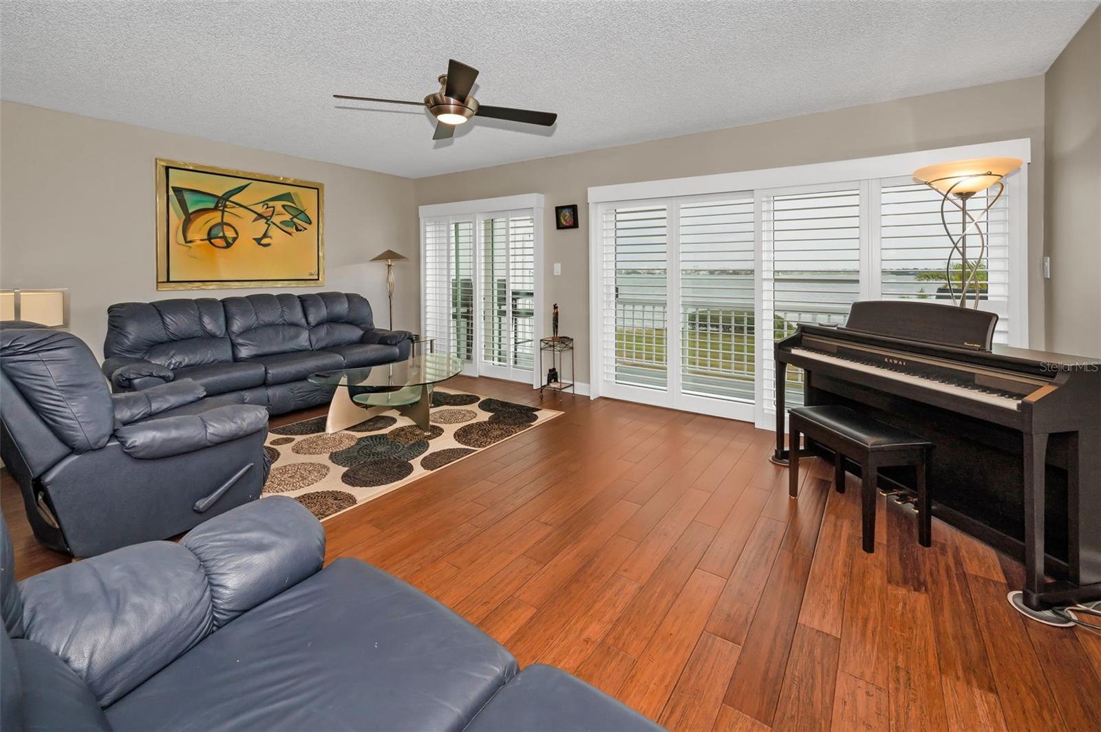 Main Level Living Room with Sliders to the Balcony