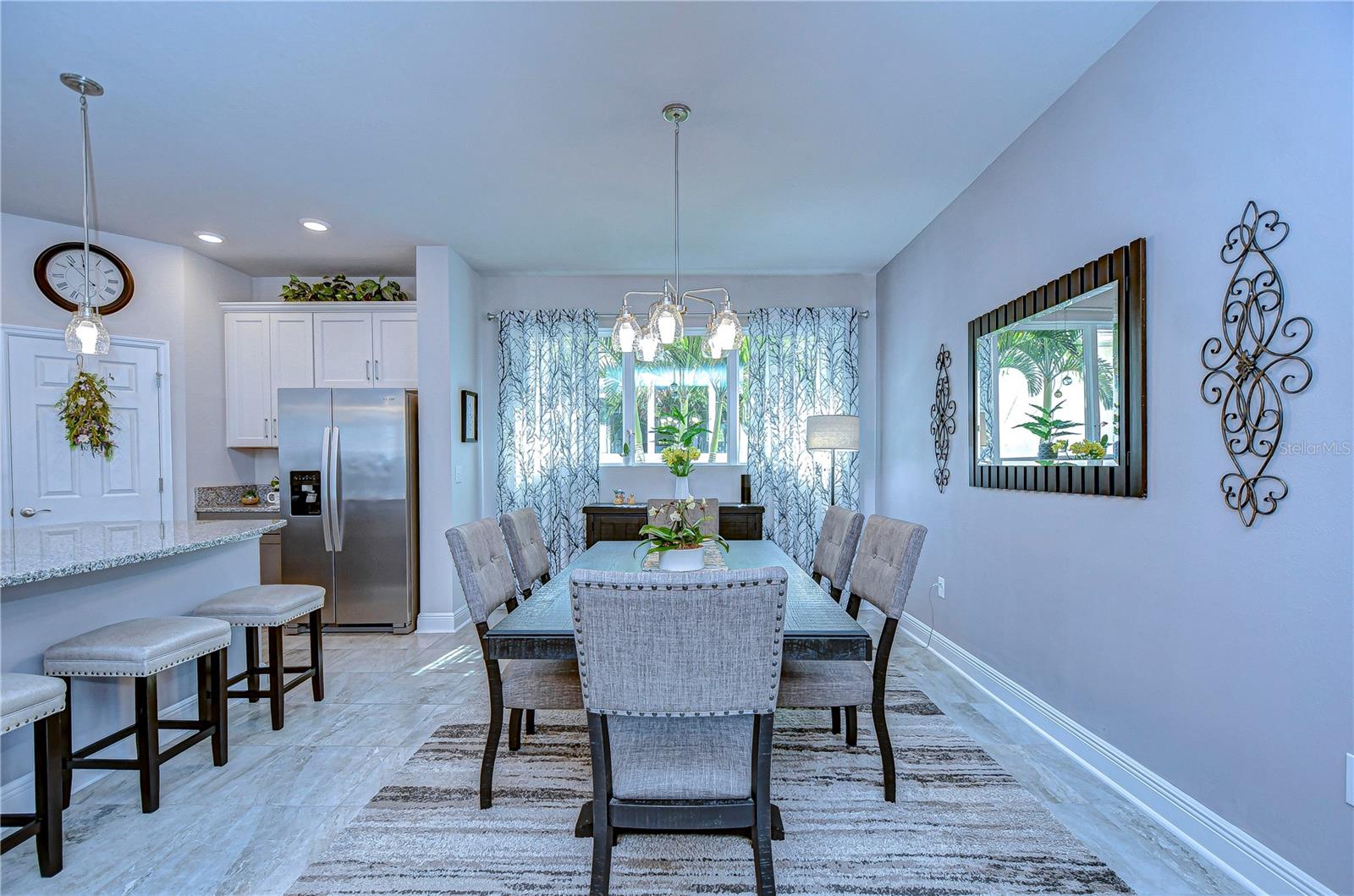 Enjoy seamless interaction with the open-plan kitchen, featuring sleek finishes and a stylish breakfast bar.