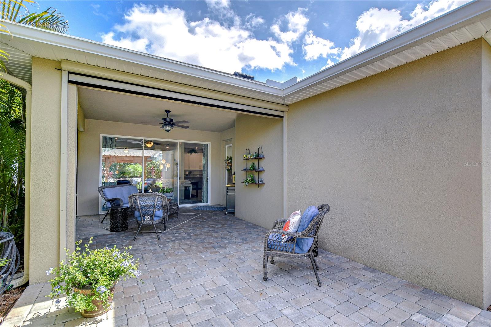 This cozy patio offers seamless indoor-outdoor living,