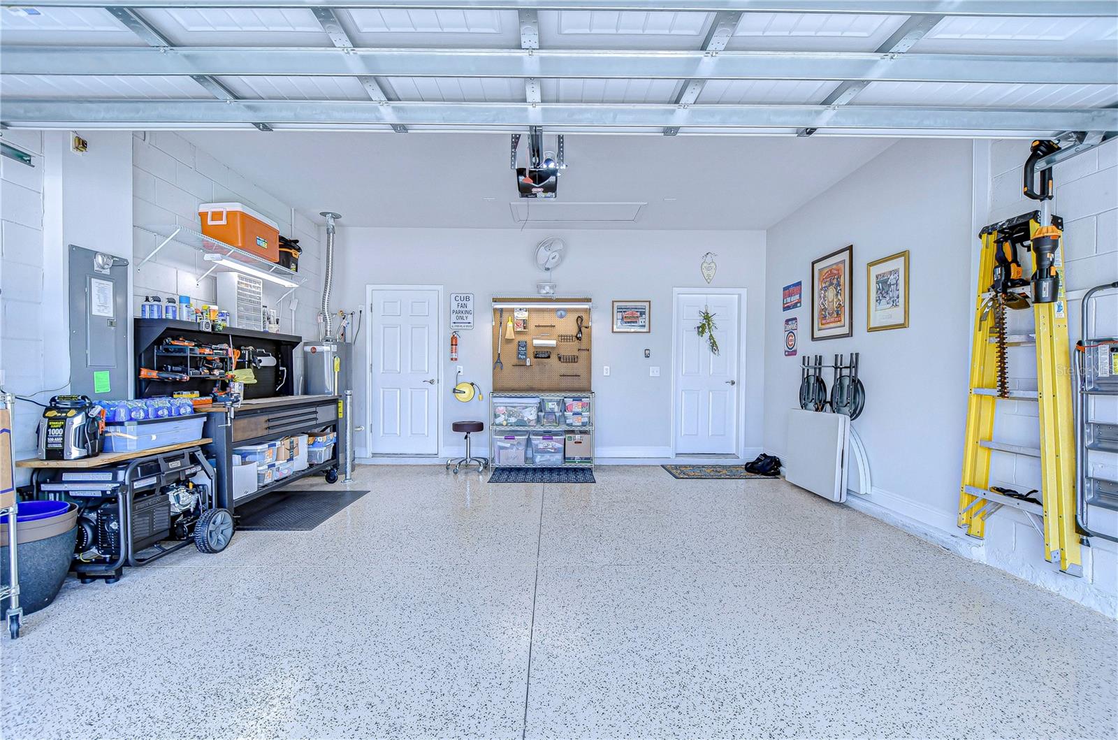 Spacious and impeccably organized garage ready for your tools and projects.