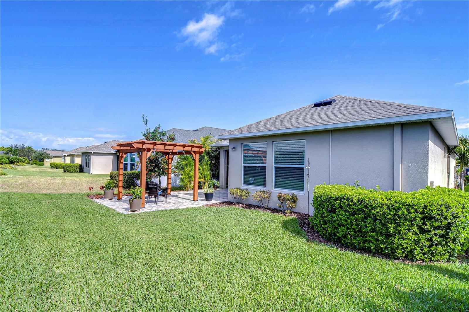 Additional yard space with beautiful lush landscaping!