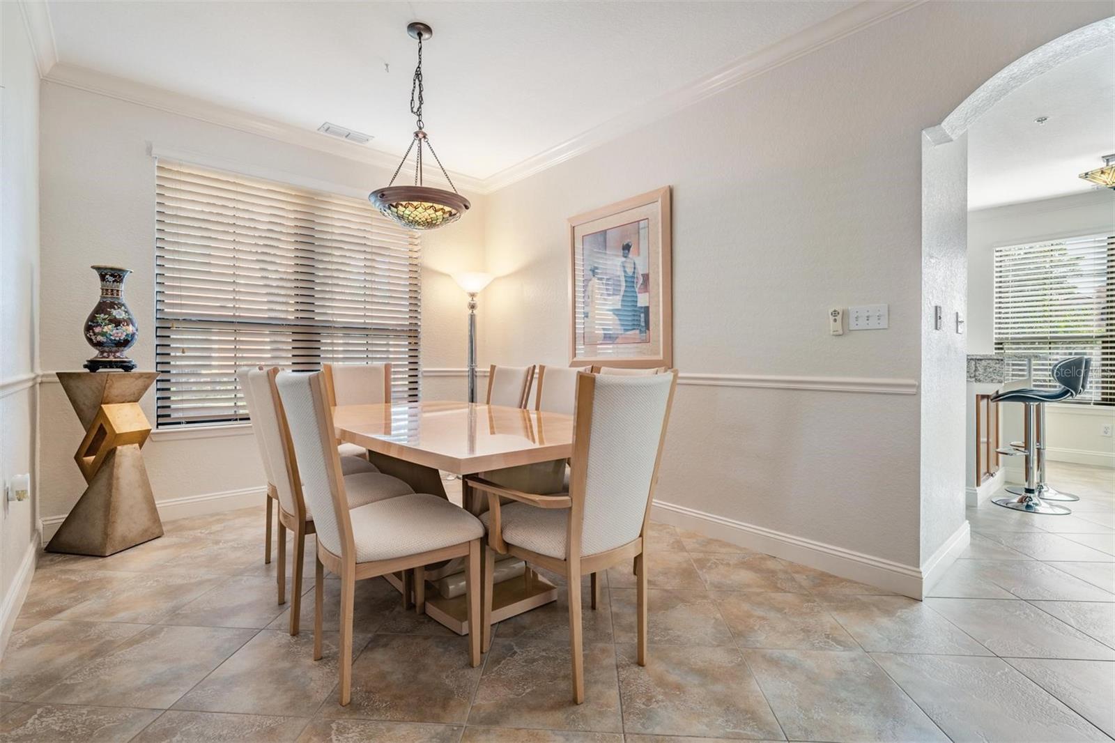 Dining room with ample space for large dining table and seating for 8