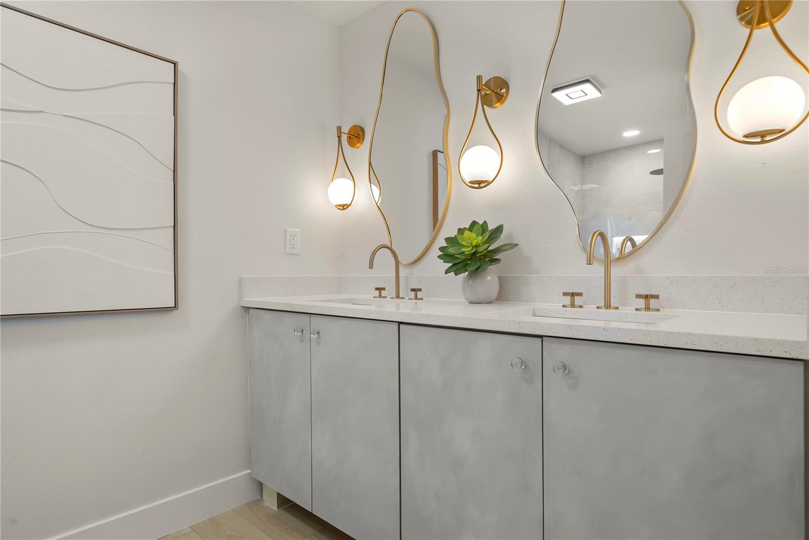 Up close detail of the dual vanities in the Primary bedroom