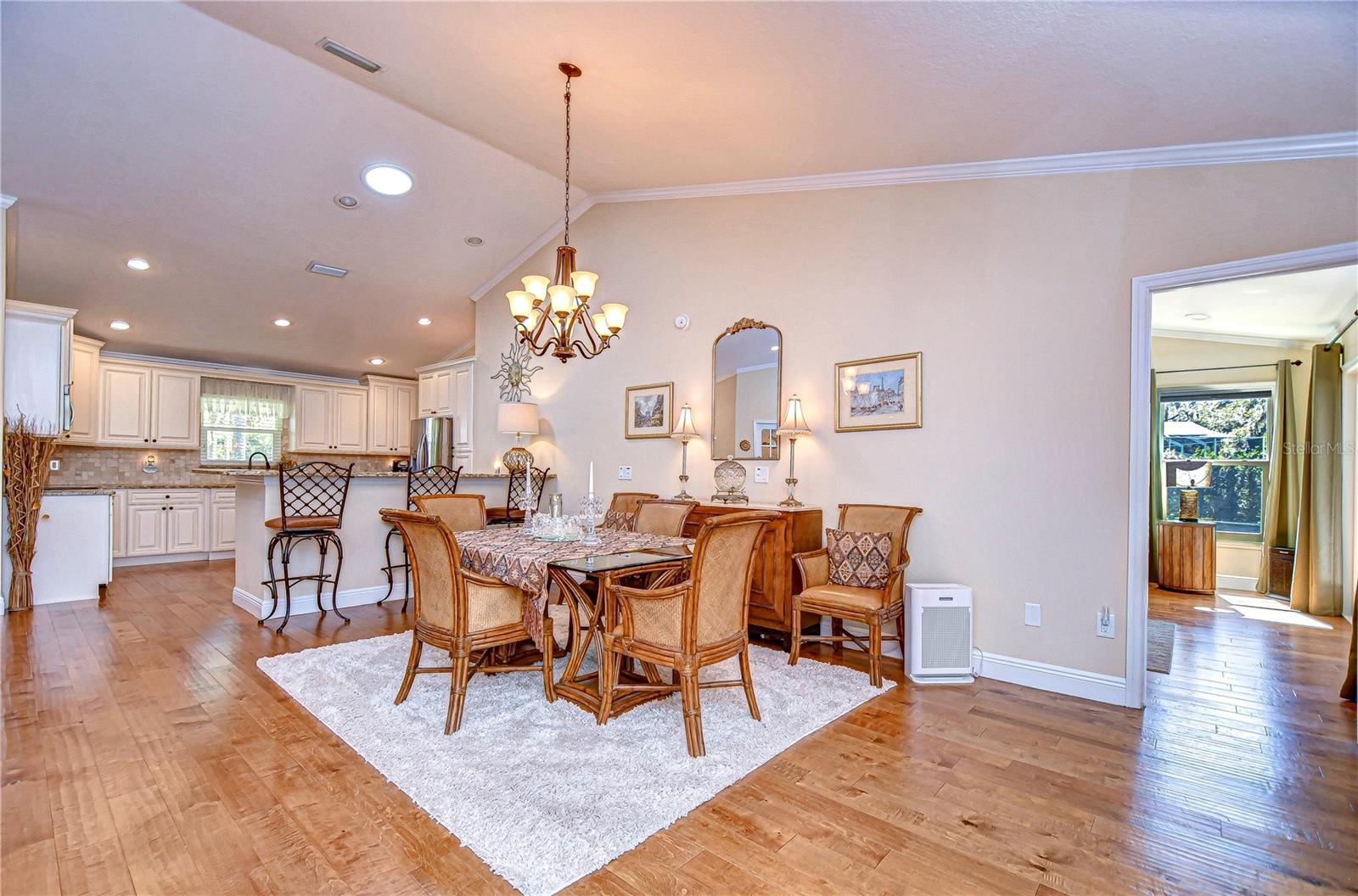 The open floor plan seamlessly integrates the kitchen.